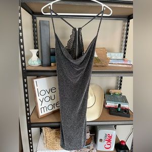 Glittery silver New Year’s Eve dress from Exlipse